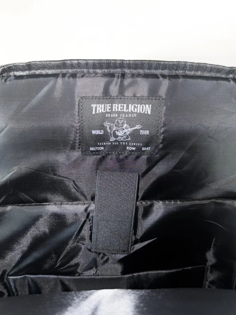 True Religion Will travel backpack in black with a volume of 23 l